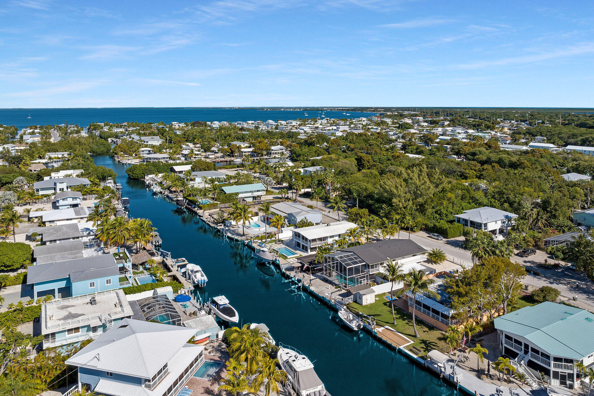 782 Bostwick Drive Key Largo, FL 33037 - Photo 57 of 63 an aerial view of residential houses with outdoor space