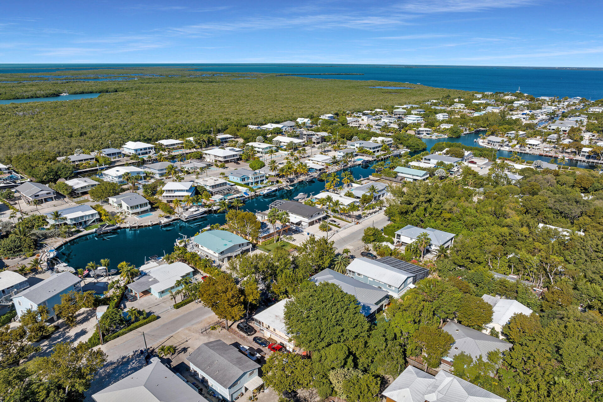 782 Bostwick Drive Key Largo, FL 33037 - Photo 59 of 63 an aerial view of ocean and residential houses with outdoor space