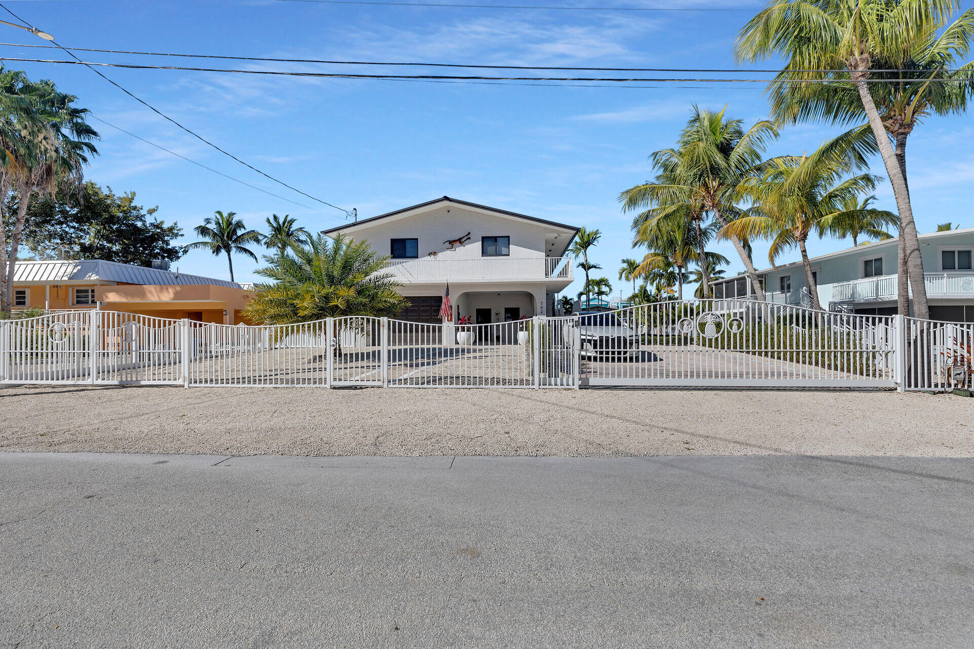 782 Bostwick Drive Key Largo, FL 33037 - Photo 9 of 63 front view of a house with a street