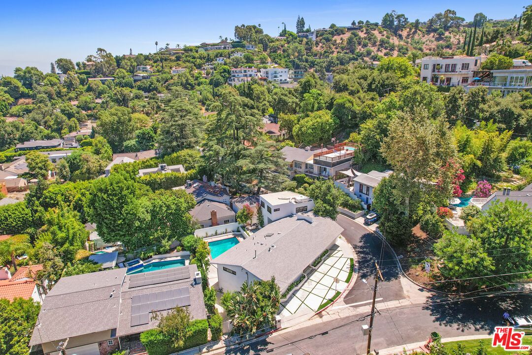 4166 Crisp Canyon Road Sherman Oaks, CA 91403 - Photo 49 of 54 an aerial view of a house with a yard