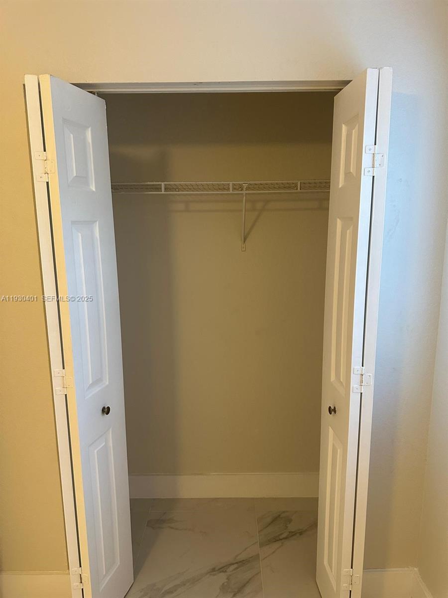 12421 Southwest 50th Court, Unit 337 Miramar, FL 33027 - Photo 16 of 46 a bathroom with a glass door shower