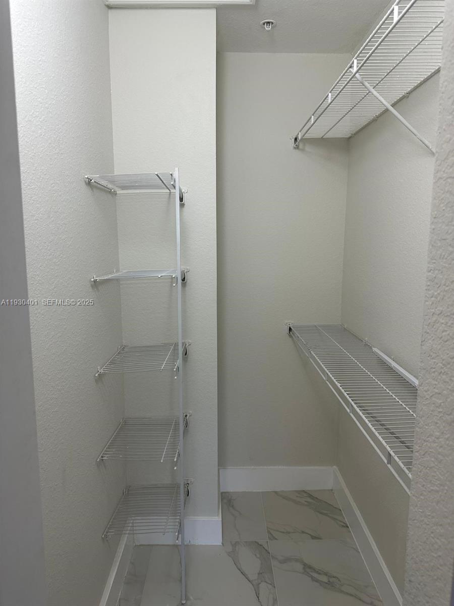 12421 Southwest 50th Court, Unit 337 Miramar, FL 33027 - Photo 23 of 46 a view of walk in closet
