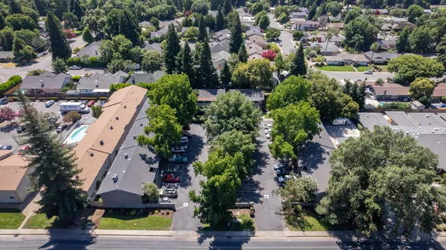 an aerial view of a city with lots of residential buildings