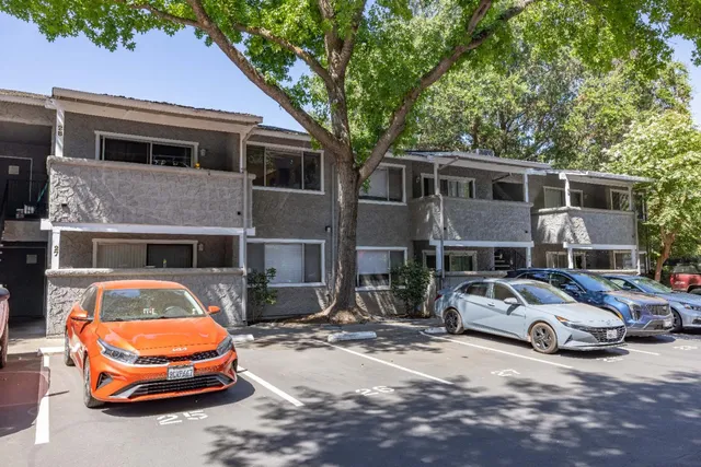 a car parked in front of a house