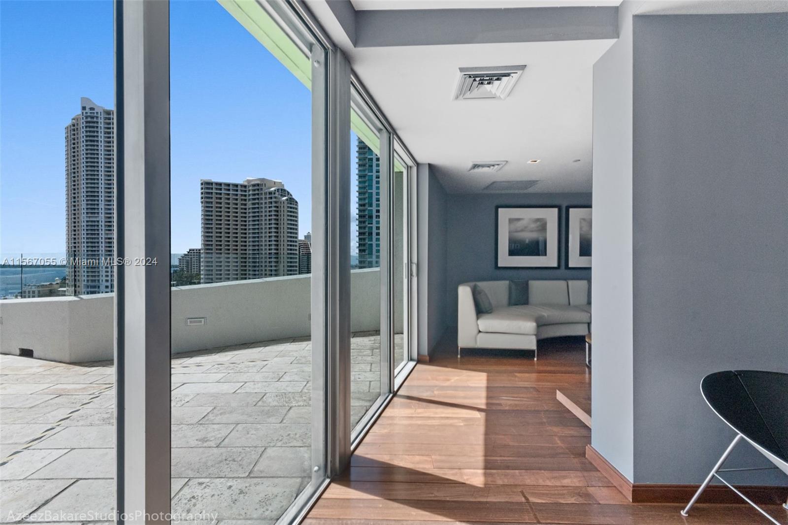 335 South Biscayne Boulevard, Unit 2703 Miami, FL 33131 - Photo 19 of 55 a balcony with view of living room