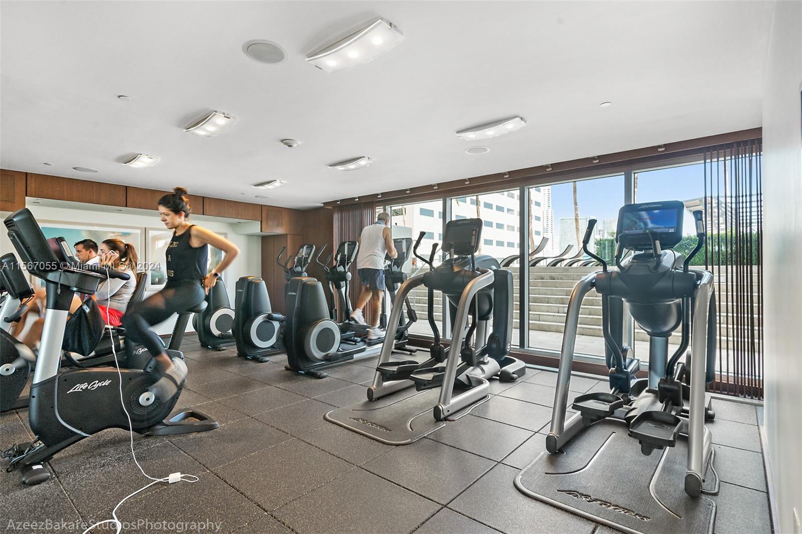 335 South Biscayne Boulevard, Unit 2703 Miami, FL 33131 - Photo 40 of 55 a view of a room with gym equipment