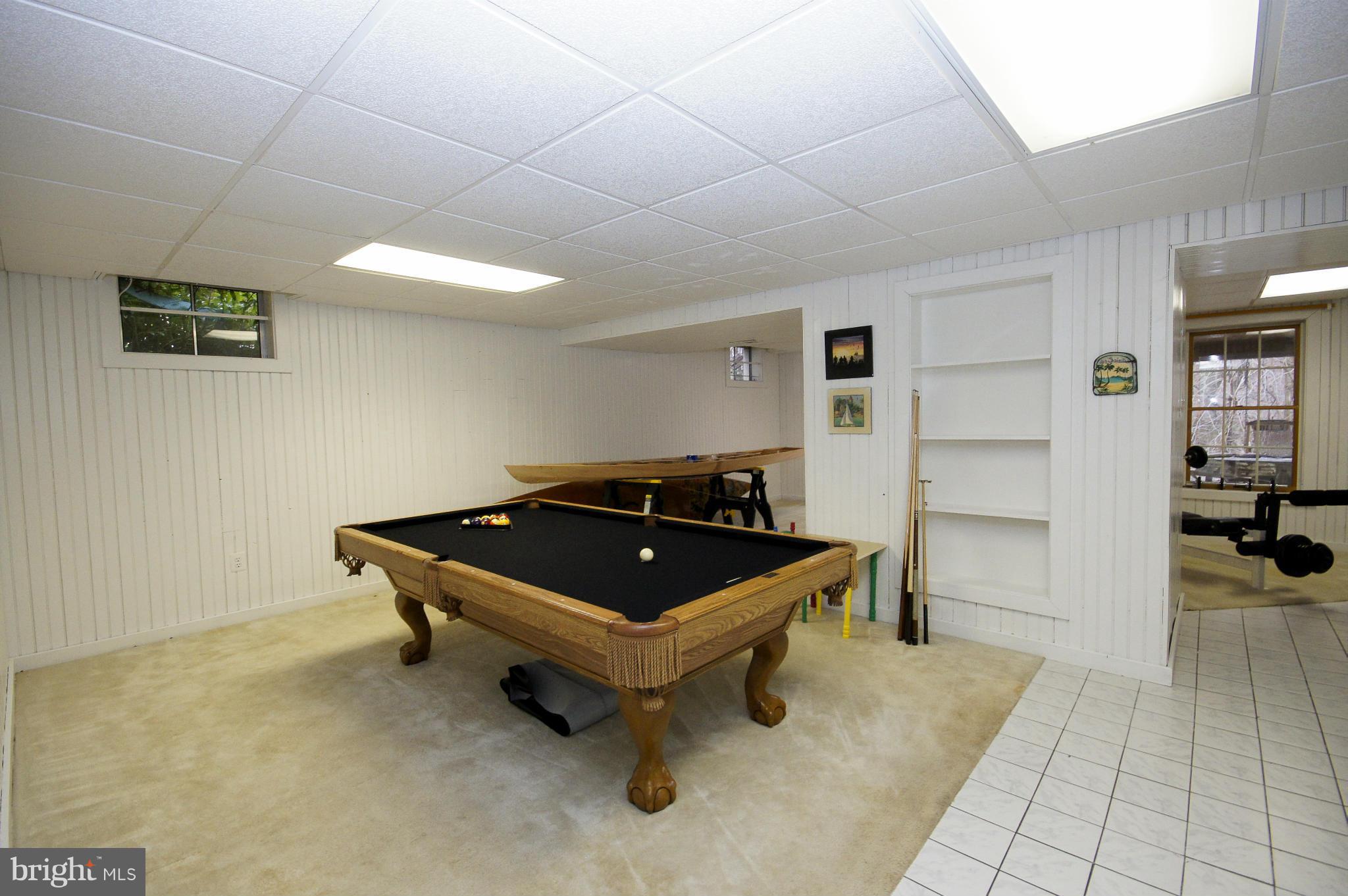 9729 Starling Road Ellicott City, MD 21042 - Photo 22 of 28 Built in Shelving, Walkout to Patio
