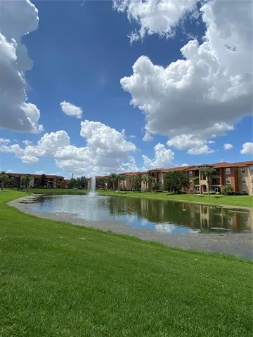 a view of a house with a iron gate