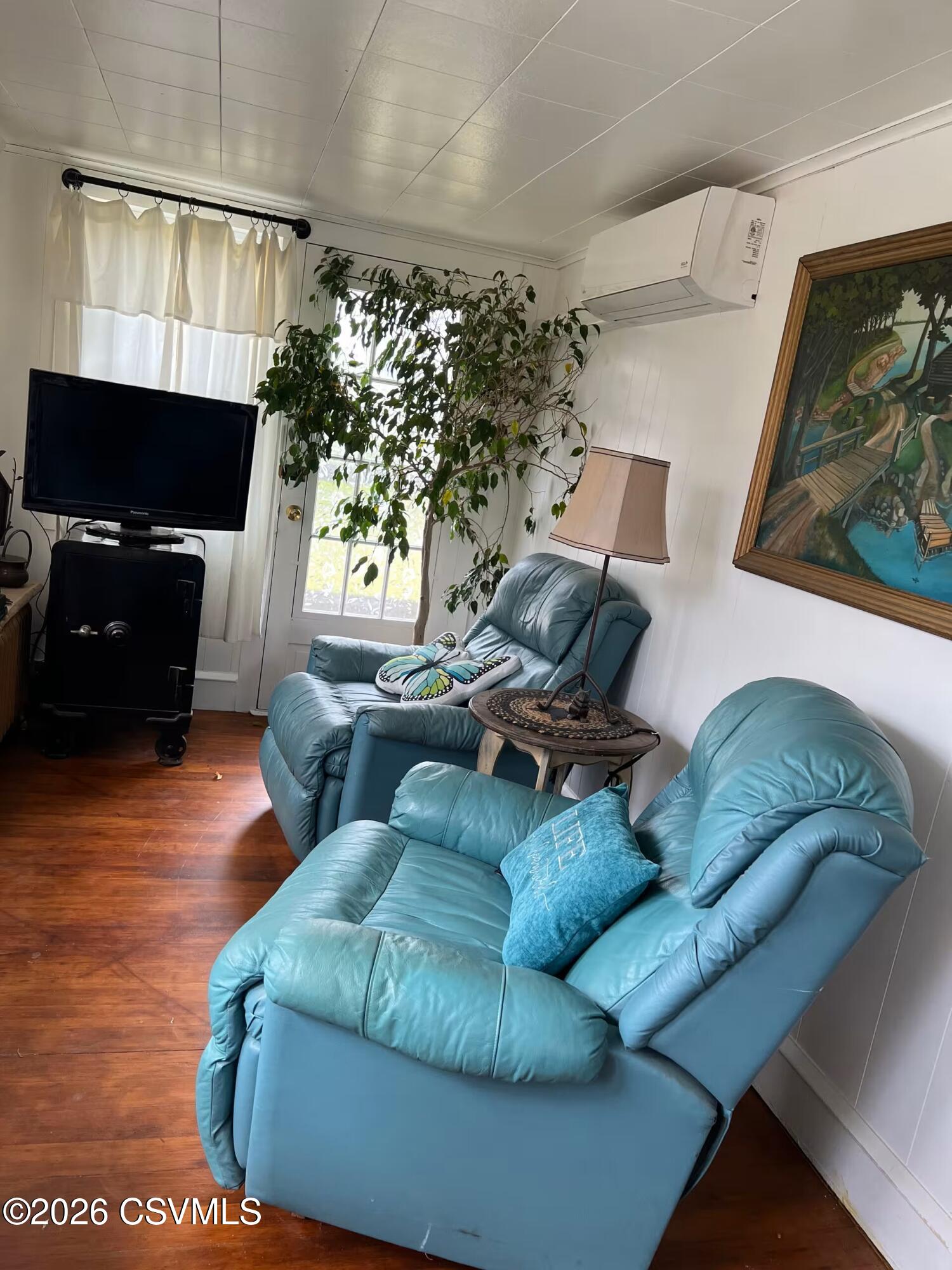 44 Mountain Road Catawissa, PA 17820 - Photo 7 of 21 a living room with furniture and a flat screen tv