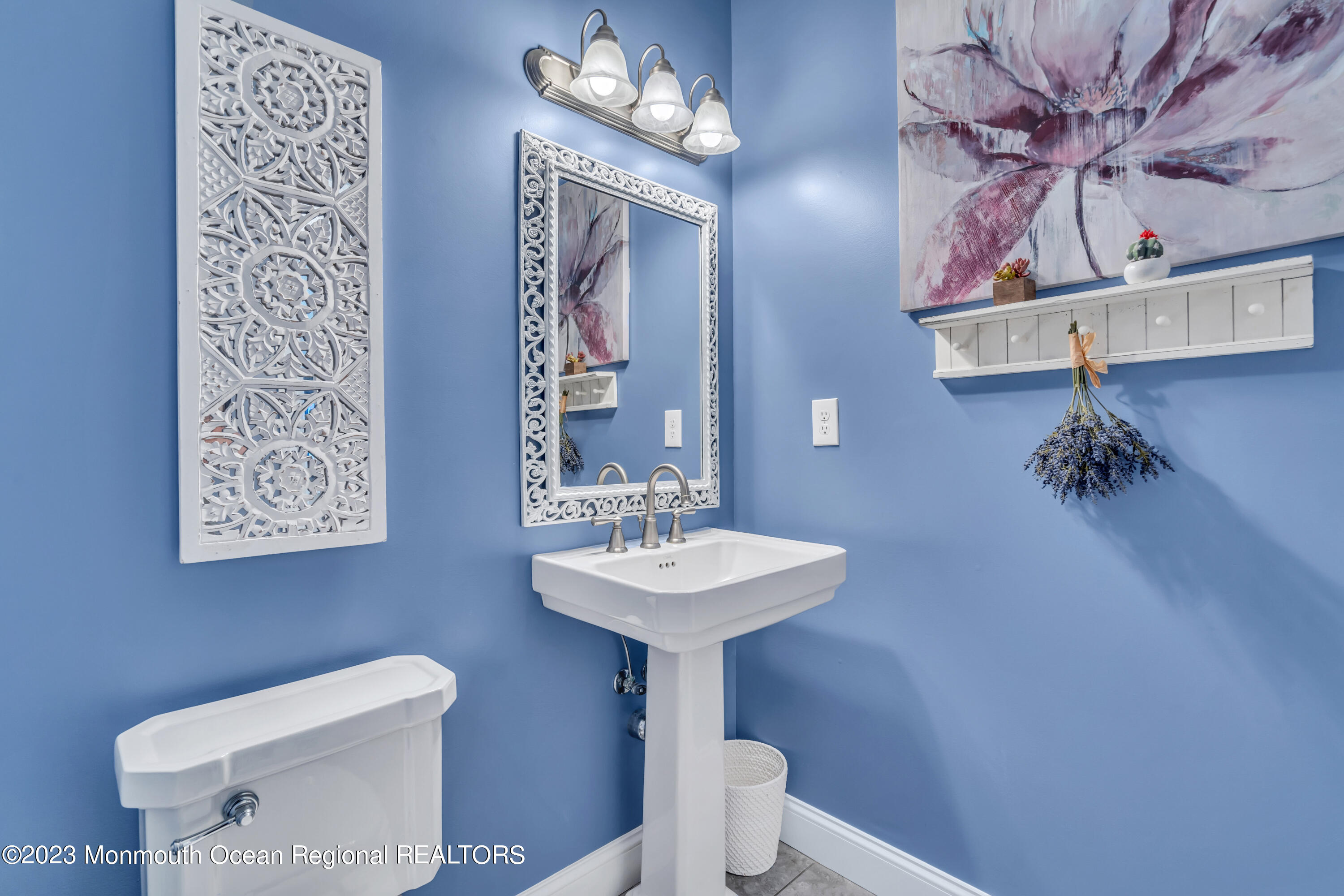 304 Wayne Avenue Pine Beach, NJ 08741 - Photo 16 of 94 a bathroom with a sink a toilet and mirror