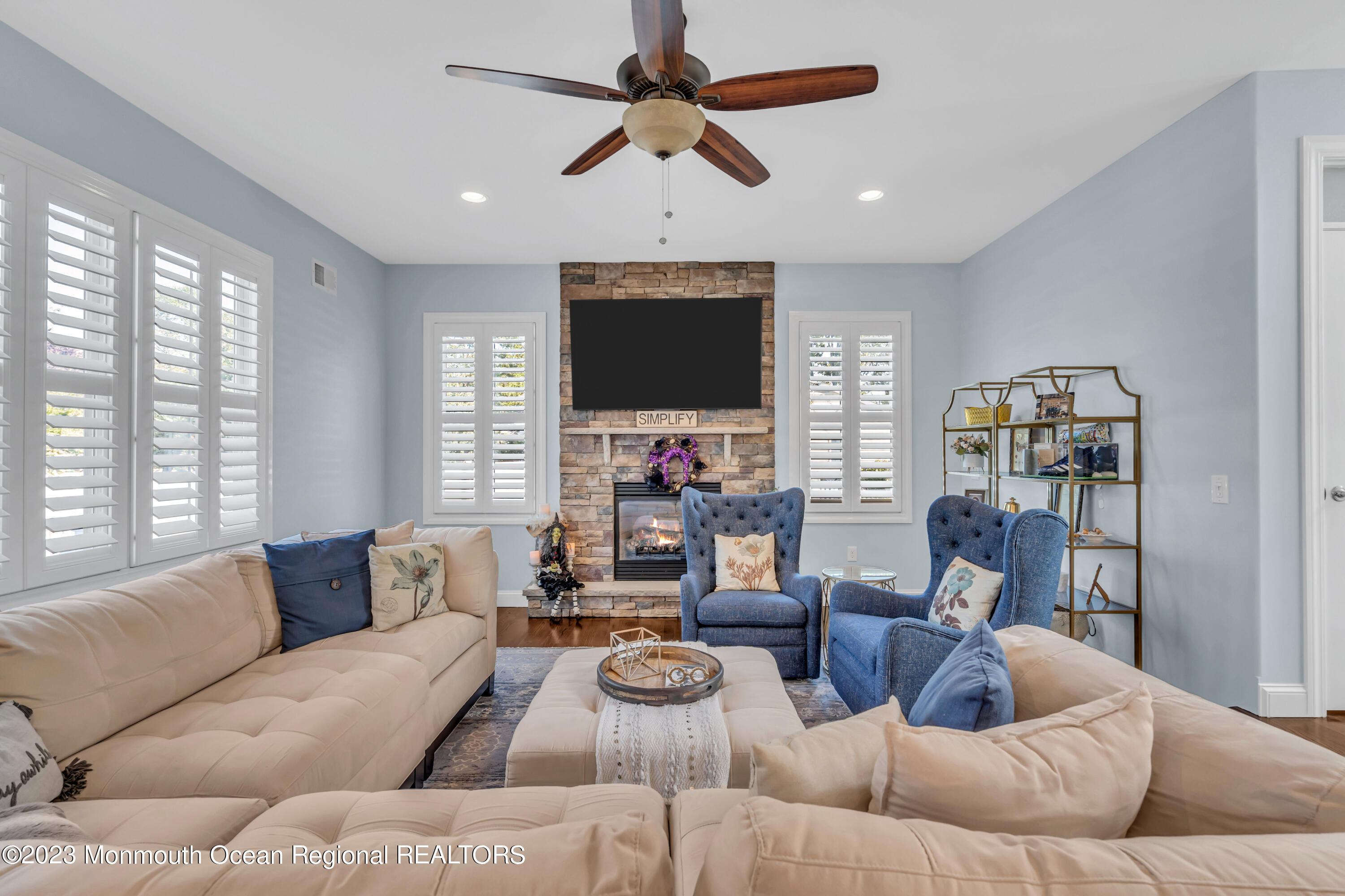 304 Wayne Avenue Pine Beach, NJ 08741 - Photo 22 of 94 a living room with furniture and a flat screen tv