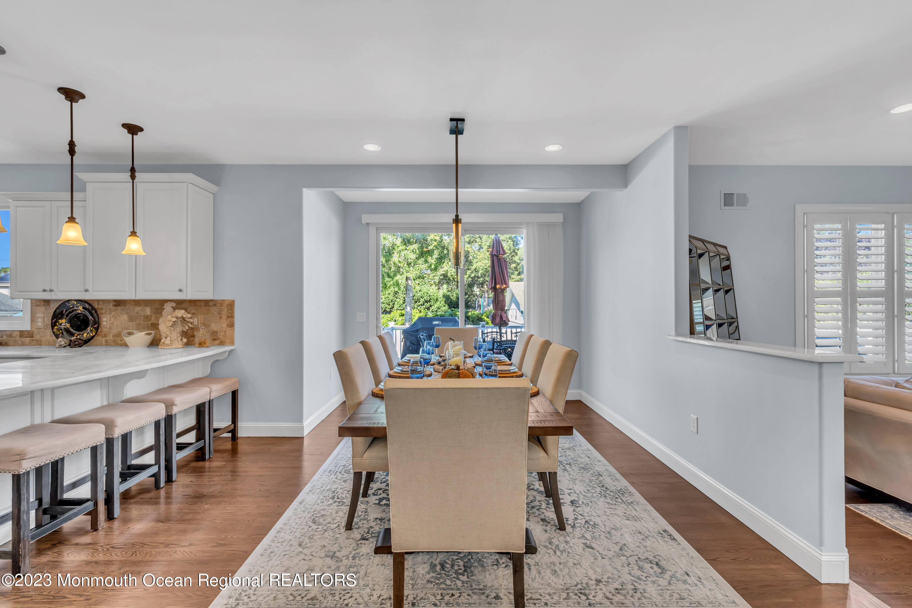 304 Wayne Avenue Pine Beach, NJ 08741 - Photo 31 of 94 a dining room with furniture a rug and wooden floor