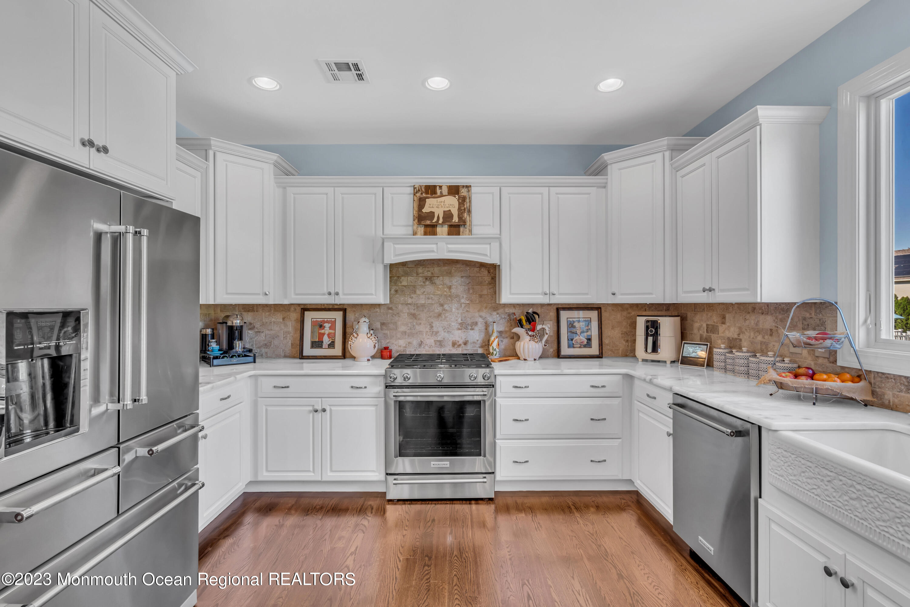 304 Wayne Avenue Pine Beach, NJ 08741 - Photo 42 of 94 a kitchen with stainless steel appliances granite countertop a stove a sink and a refrigerator