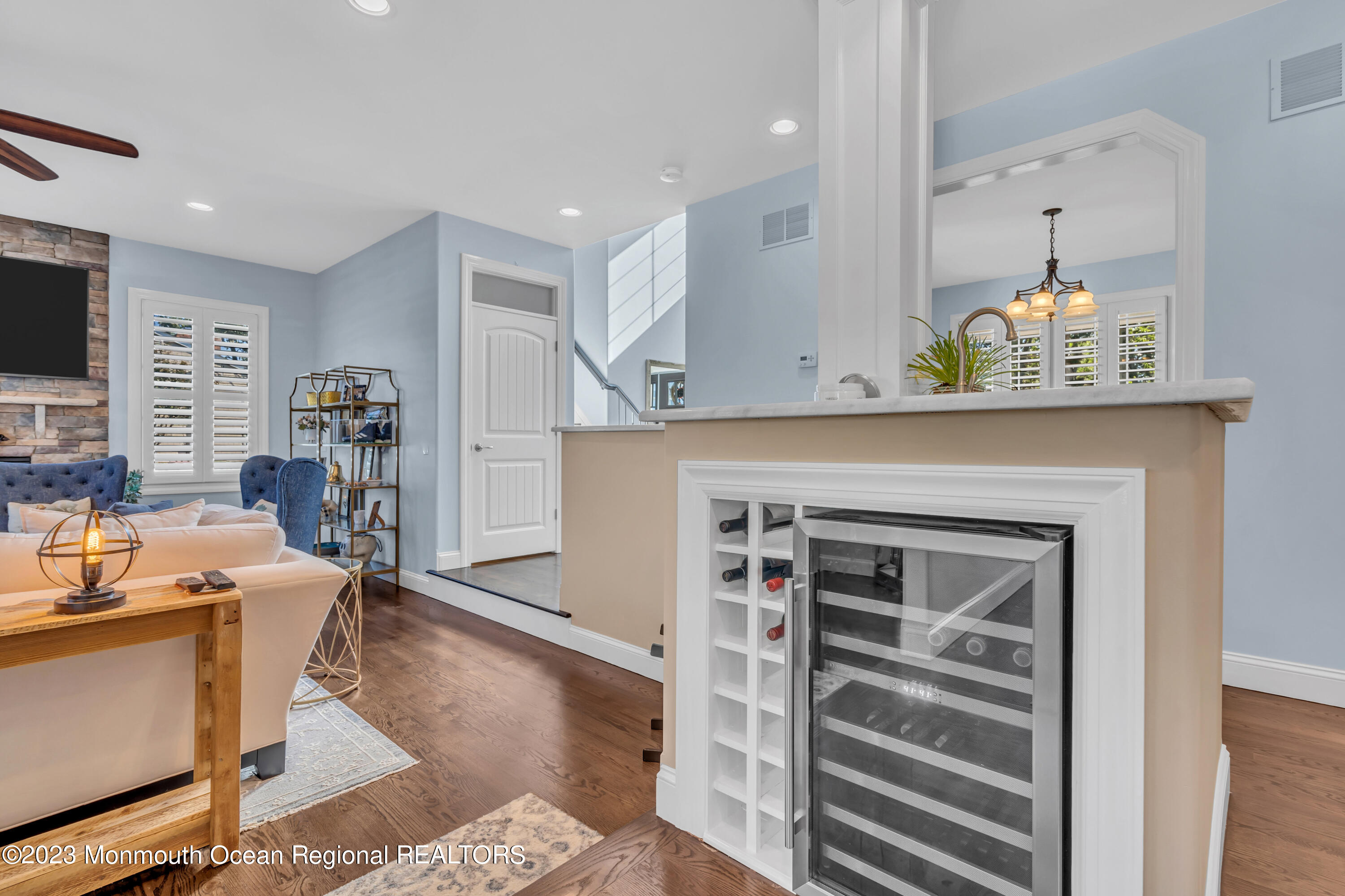 304 Wayne Avenue Pine Beach, NJ 08741 - Photo 52 of 94 a view of a workspace with furniture and wooden floor