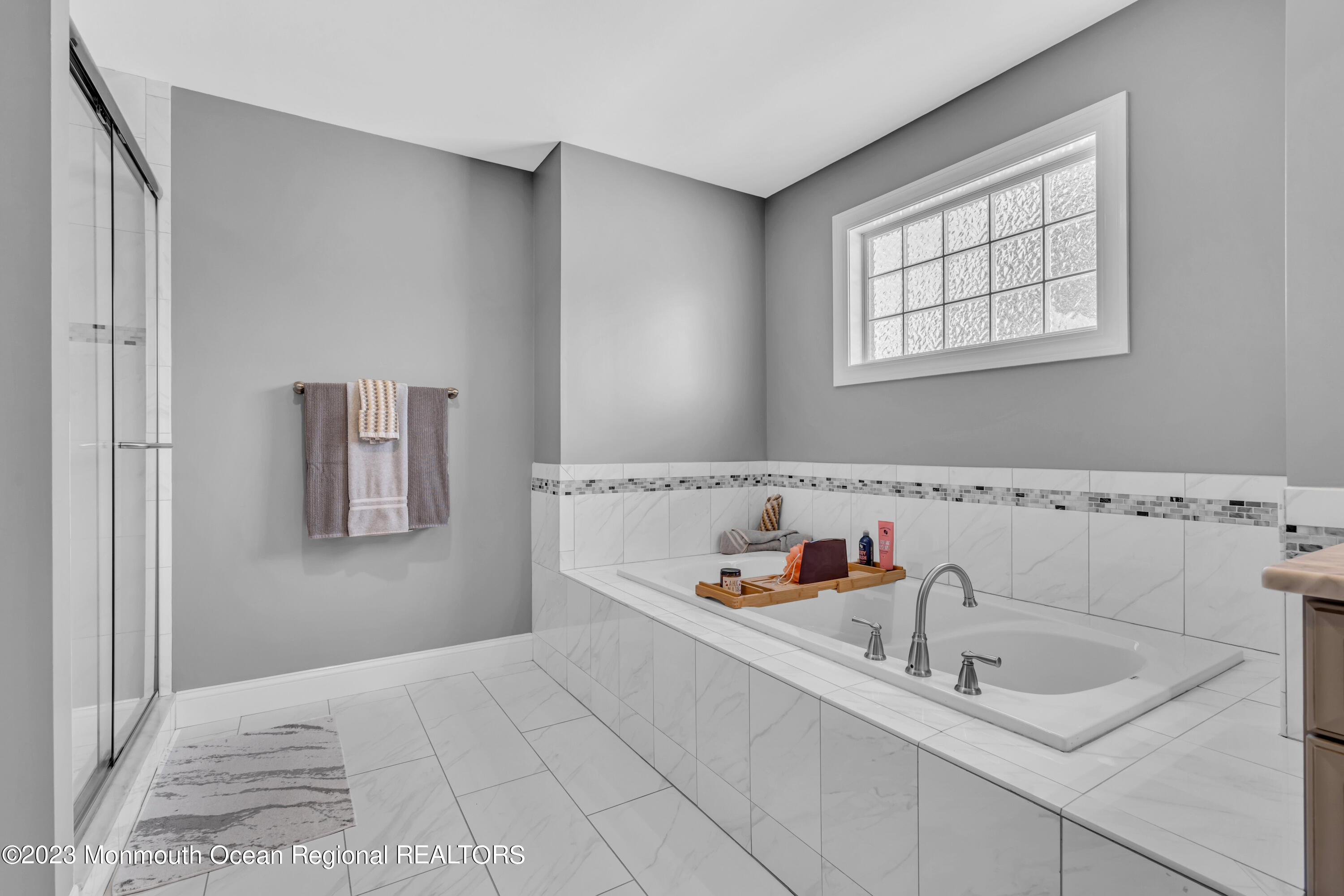 304 Wayne Avenue Pine Beach, NJ 08741 - Photo 69 of 94 a bathroom with a sink and a mirror