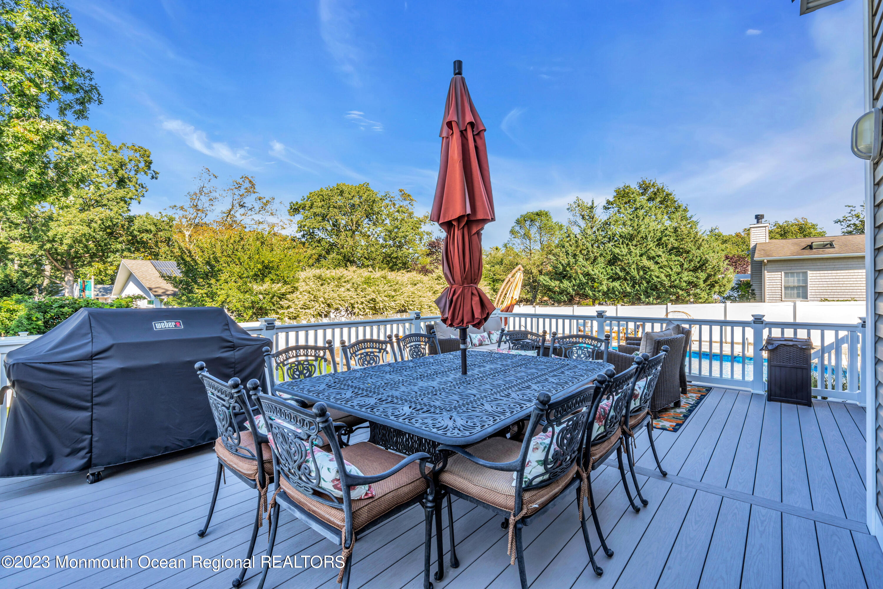304 Wayne Avenue Pine Beach, NJ 08741 - Photo 76 of 94 a view of a dinning table and chairs on the roof deck