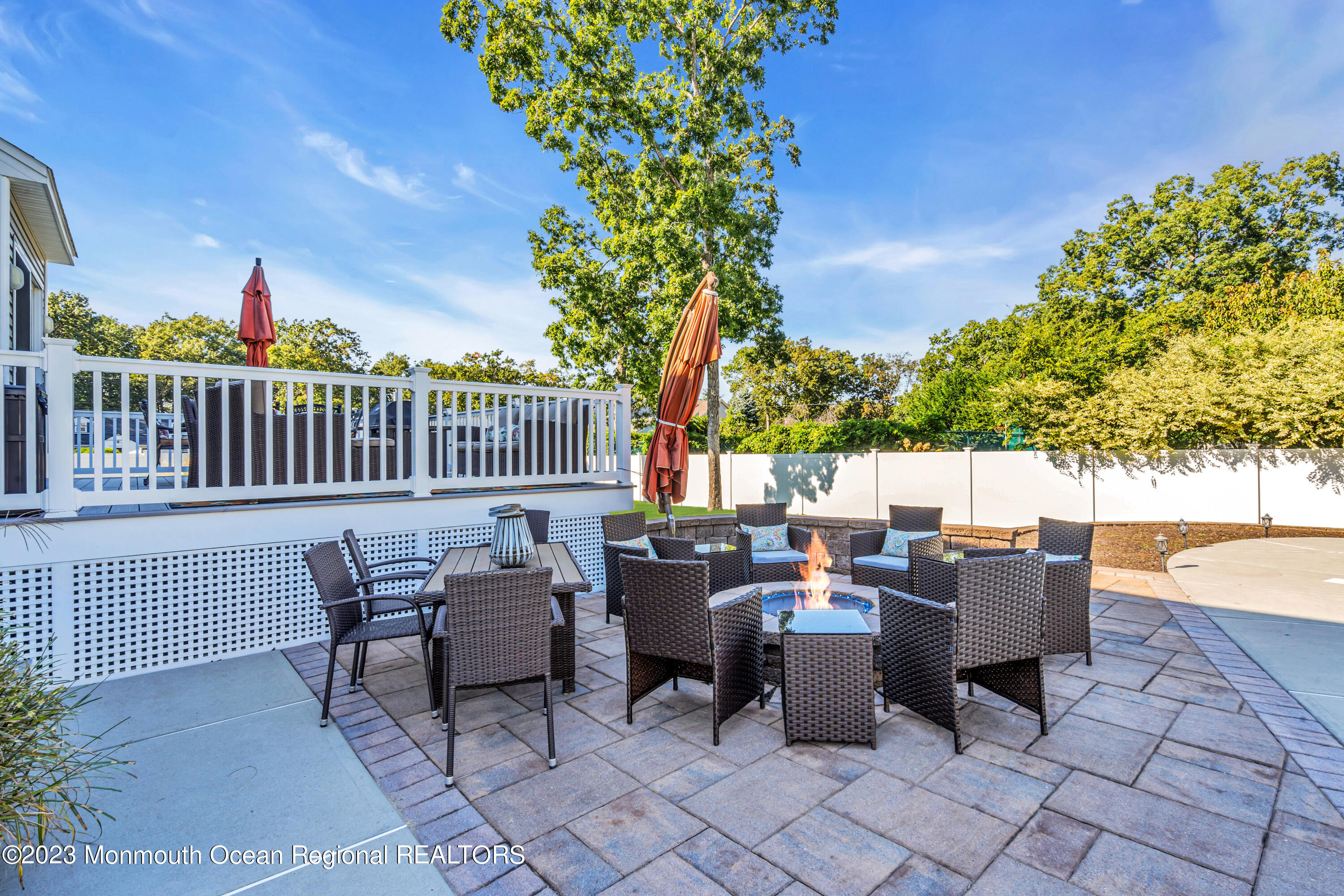 304 Wayne Avenue Pine Beach, NJ 08741 - Photo 79 of 94 a roof deck with table and chairs and potted plants