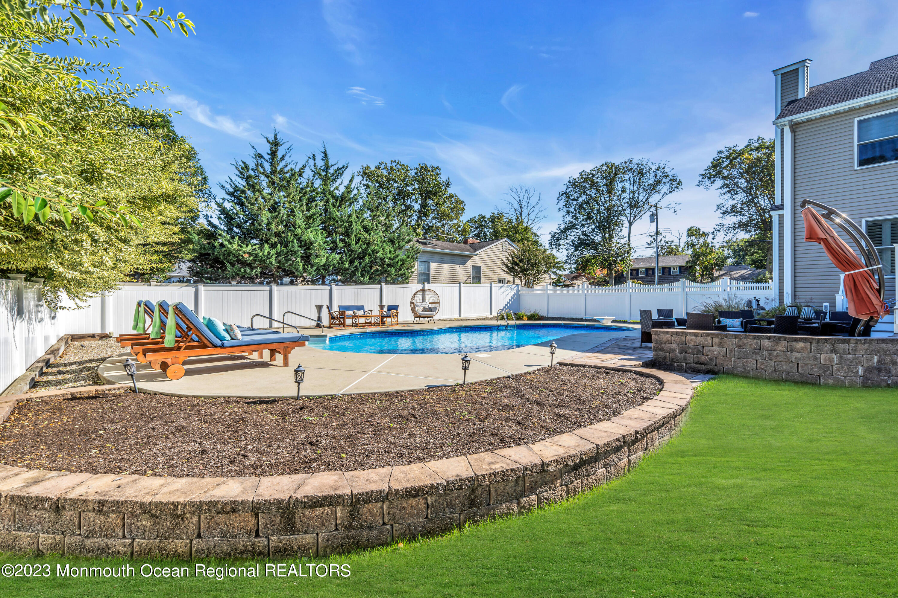 304 Wayne Avenue Pine Beach, NJ 08741 - Photo 85 of 94 a view of a backyard with a fountain