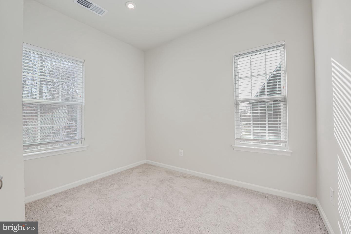 18339 Reaper Hl Court Triangle, VA 22172 - Photo 32 of 34 an empty room with a window