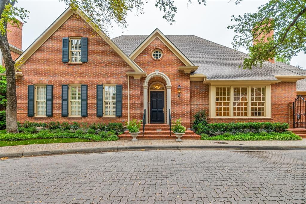 5804 Redwood Court Dallas, TX 75209 - Photo 1 of 1 View of front of house featuring a shingled roof, a chimney, and brick siding