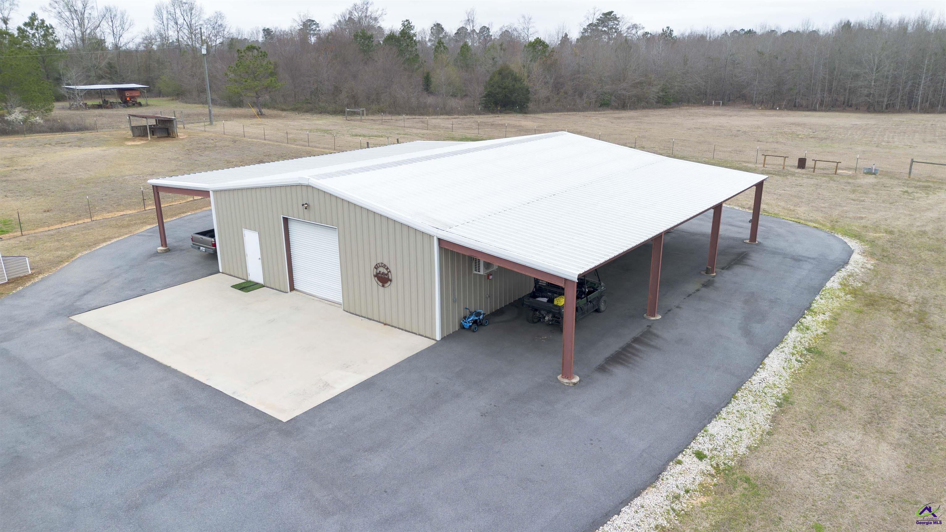 500 Old Milledgeville Road Cochran, GA 31014 - Photo 14 of 48 a view of a terrace with a lake