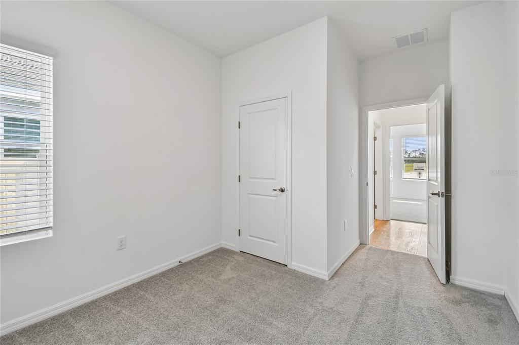 5836 Native Oak Street Mount Dora, FL 32757 - Photo 27 of 39 a view of an empty room and closet