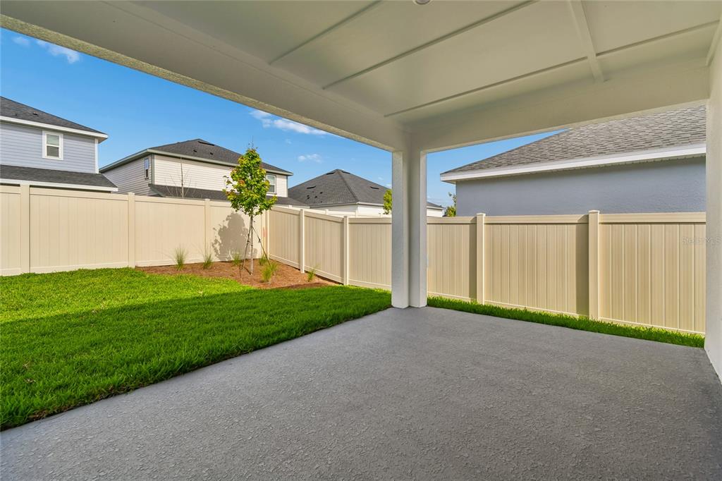 5836 Native Oak Street Mount Dora, FL 32757 - Photo 31 of 39 a view of a backyard of a house