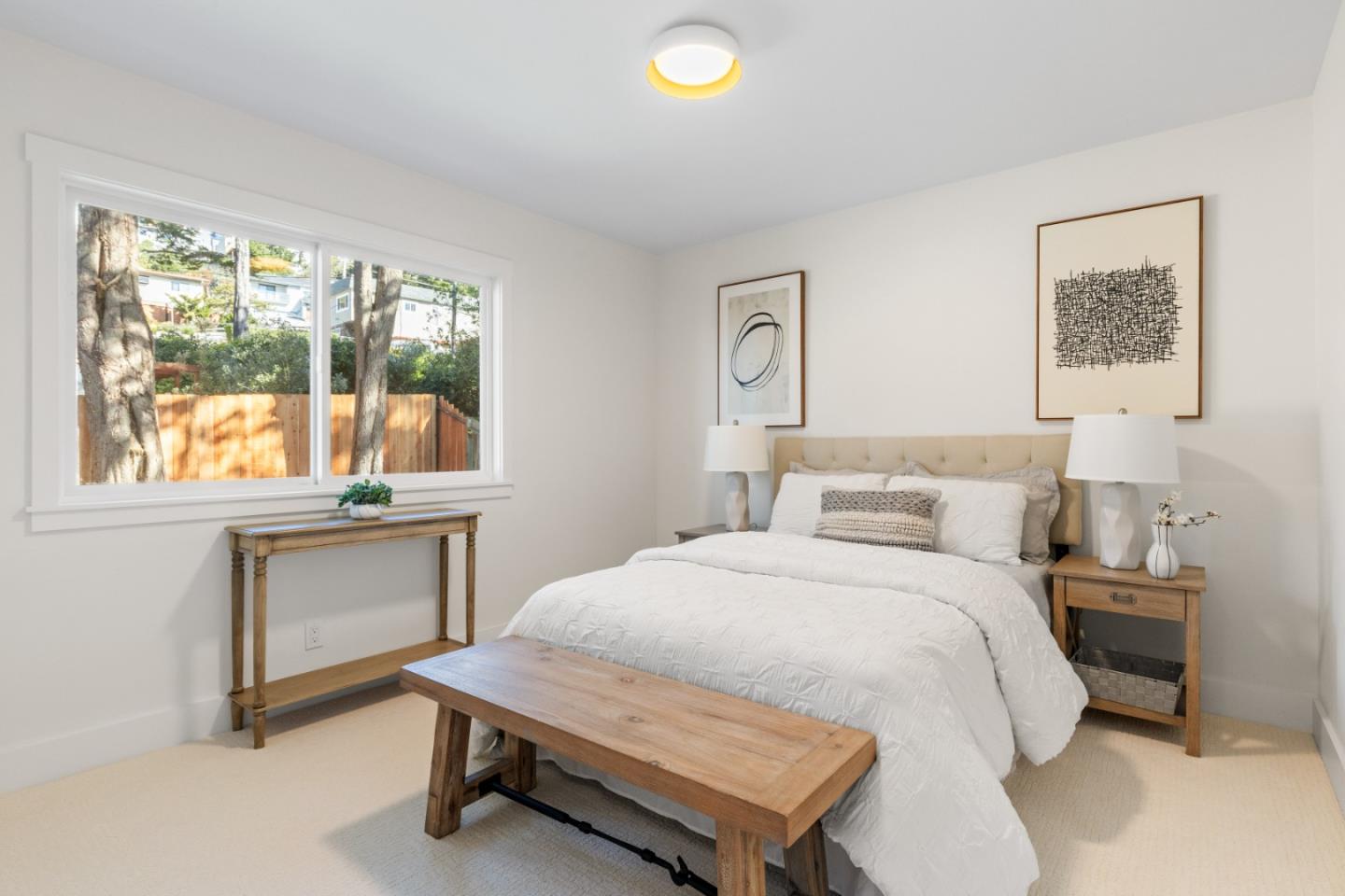 309 Channing Way Pacifica, CA 94044 - Photo 23 of 42 a bedroom with a bed and a table