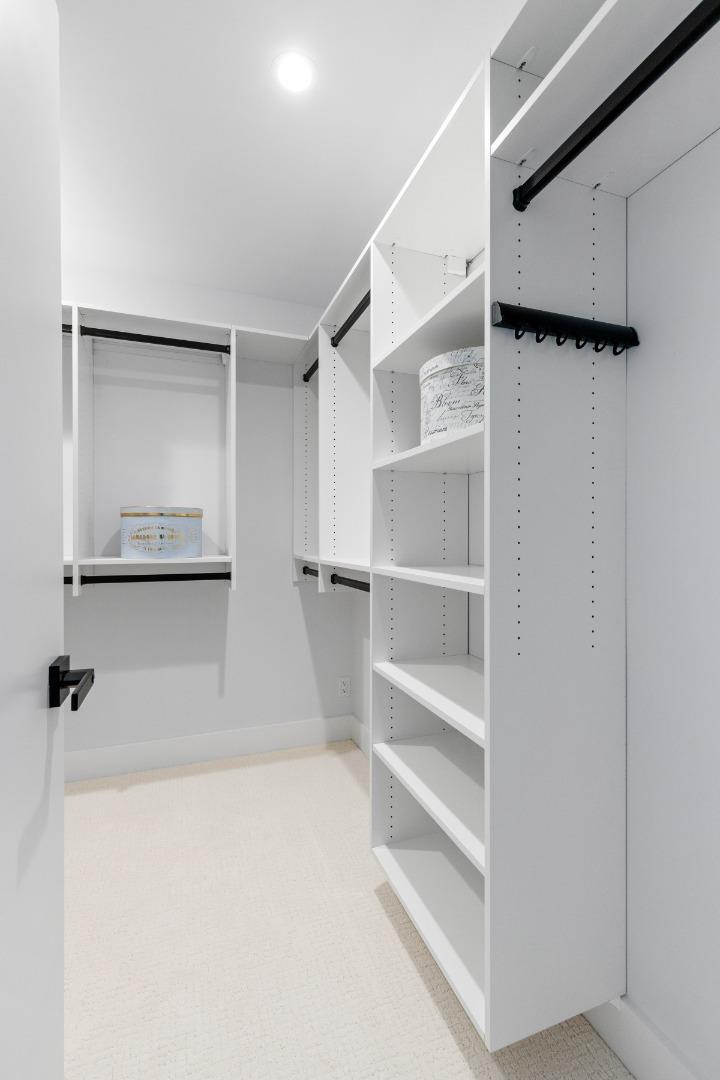 309 Channing Way Pacifica, CA 94044 - Photo 33 of 42 a view of walk in closet with empty racks