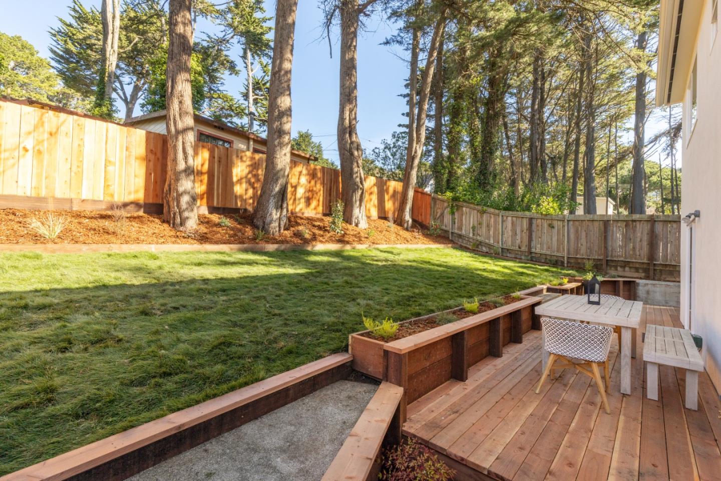 309 Channing Way Pacifica, CA 94044 - Photo 38 of 42 a view of a wooden deck with chairs
