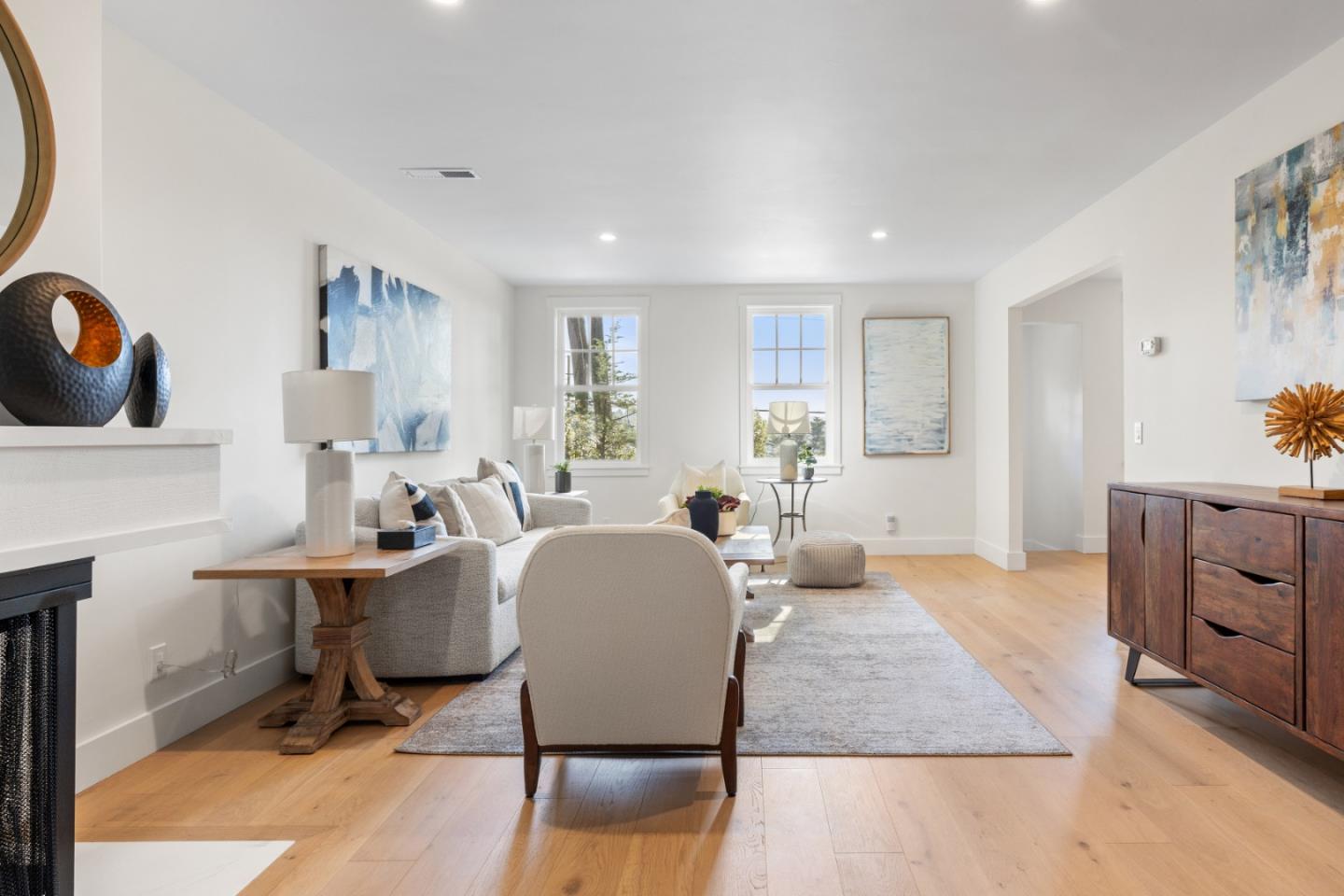 309 Channing Way Pacifica, CA 94044 - Photo 6 of 42 a living room with furniture a rug a lamp and a window