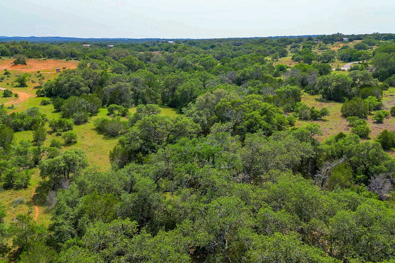 Tbd Althaus Ranch Road Johnson City, TX 78636 - Photo 15 of 36 an aerial view of residential houses with outdoor space and trees