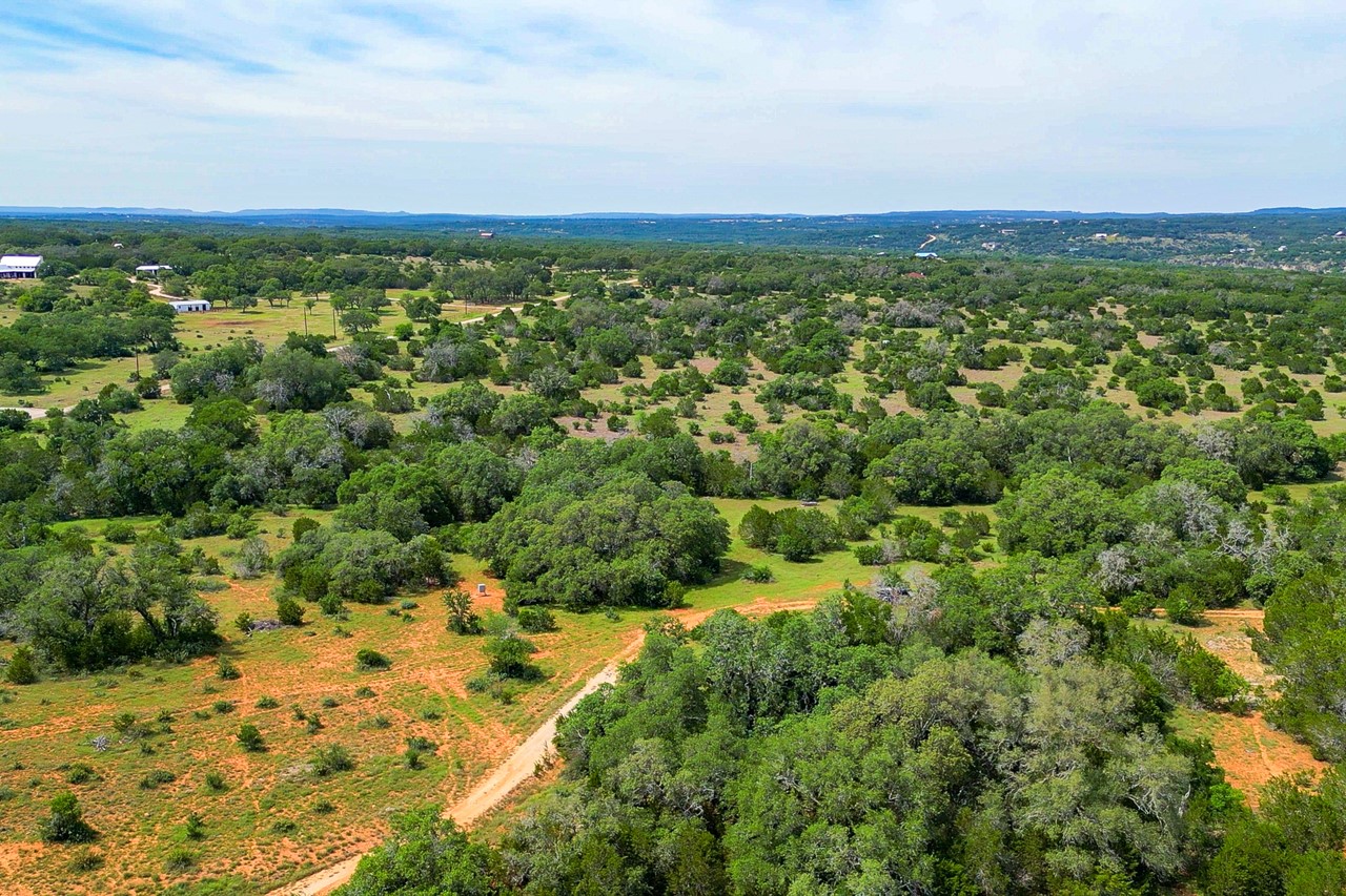 Tbd Althaus Ranch Road Johnson City, TX 78636 - Photo 5 of 36 a view of a city with lush green forest