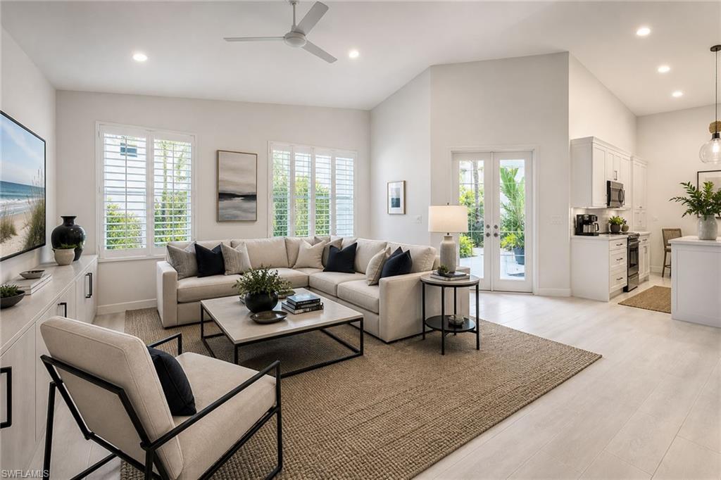 6572 Chestnut Circle Naples, FL 34109 - Photo 4 of 19 Staged photo of Living Room (Version 2)