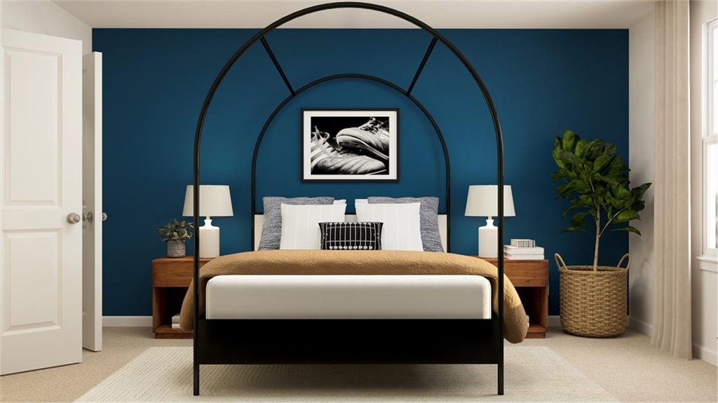 512 Almere Drive Hampton, GA 30228 - Photo 26 of 37 a bedroom with a bed and potted plant