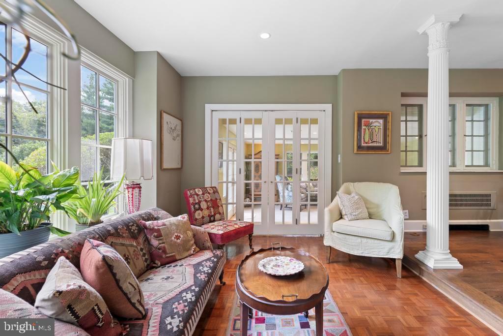 1038 Mill Rd Circle Rydal, PA 19046 - Photo 11 of 61 a living room with furniture and a large window