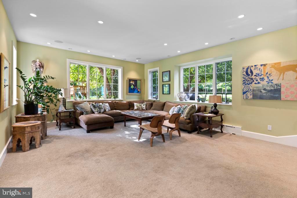 1038 Mill Rd Circle Rydal, PA 19046 - Photo 15 of 61 a living room with furniture and a large window