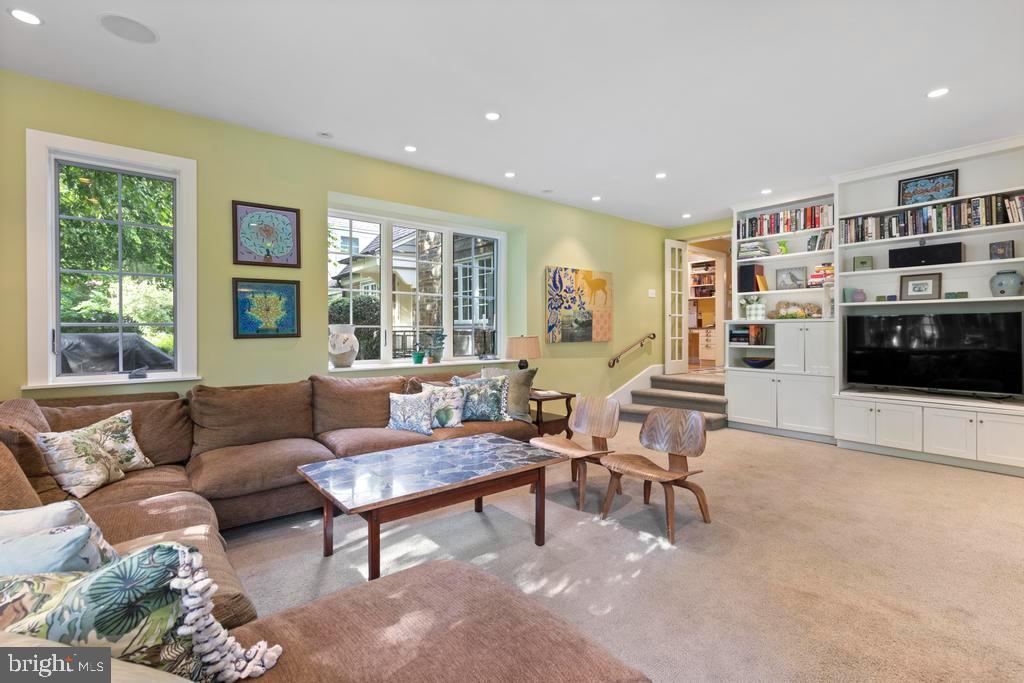 1038 Mill Rd Circle Rydal, PA 19046 - Photo 17 of 61 a living room with furniture and a flat screen tv