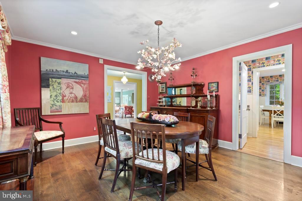 1038 Mill Rd Circle Rydal, PA 19046 - Photo 22 of 61 a view of a dining room with furniture and wooden floor