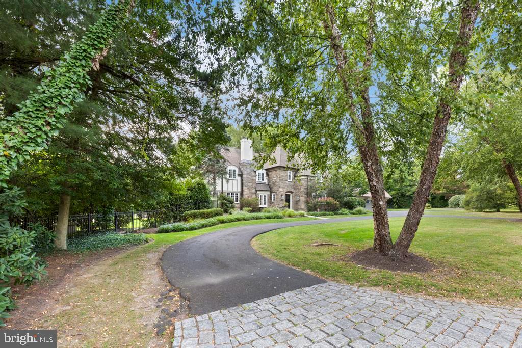 1038 Mill Rd Circle Rydal, PA 19046 - Photo 3 of 61 a view of a park with large trees