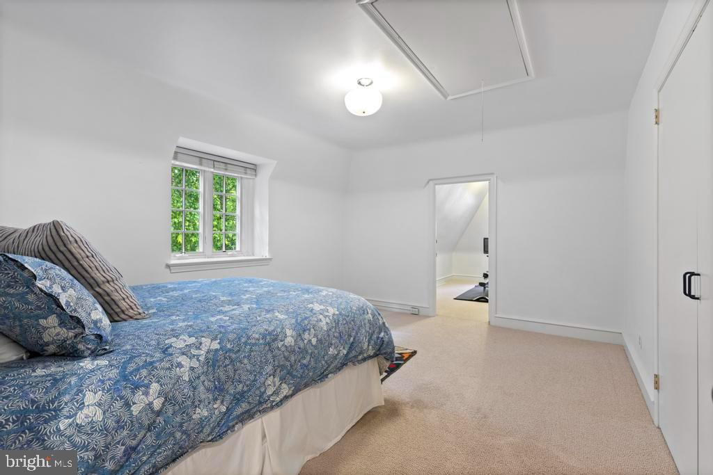 1038 Mill Rd Circle Rydal, PA 19046 - Photo 38 of 61 a bedroom with a bed and a window