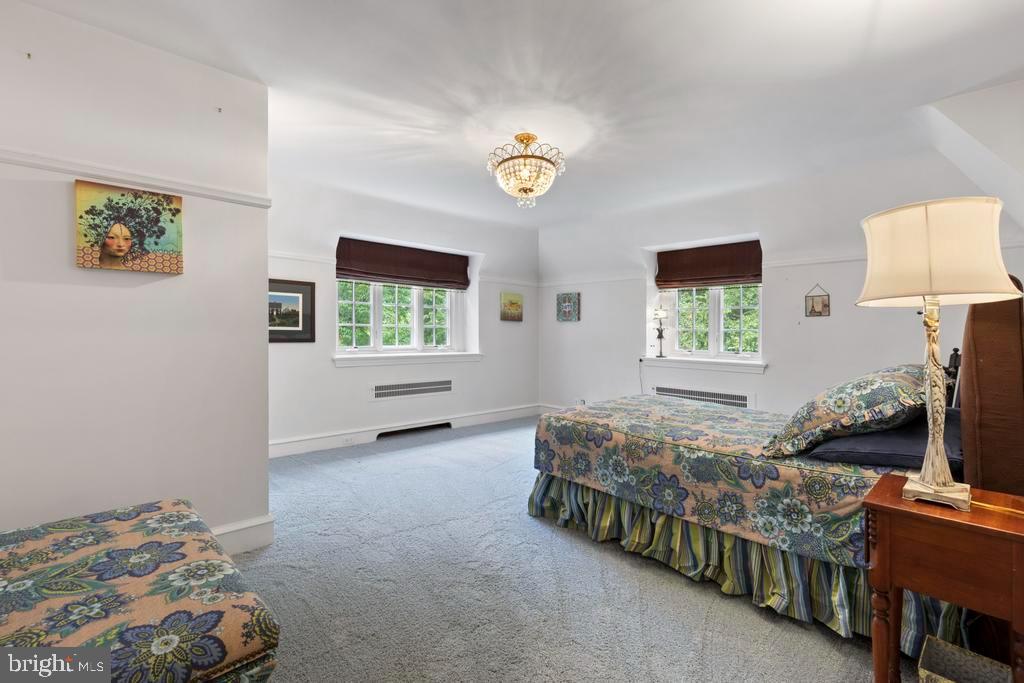 1038 Mill Rd Circle Rydal, PA 19046 - Photo 40 of 61 a bedroom with a bed and a window