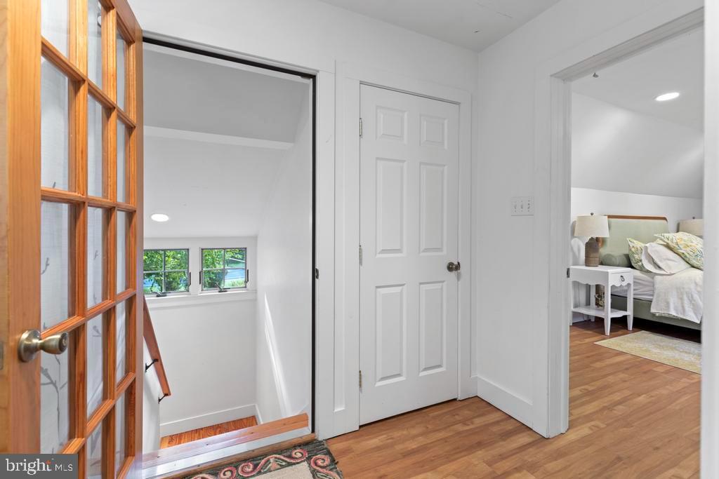 1038 Mill Rd Circle Rydal, PA 19046 - Photo 46 of 61 a view of a bedroom with wooden floor and windows