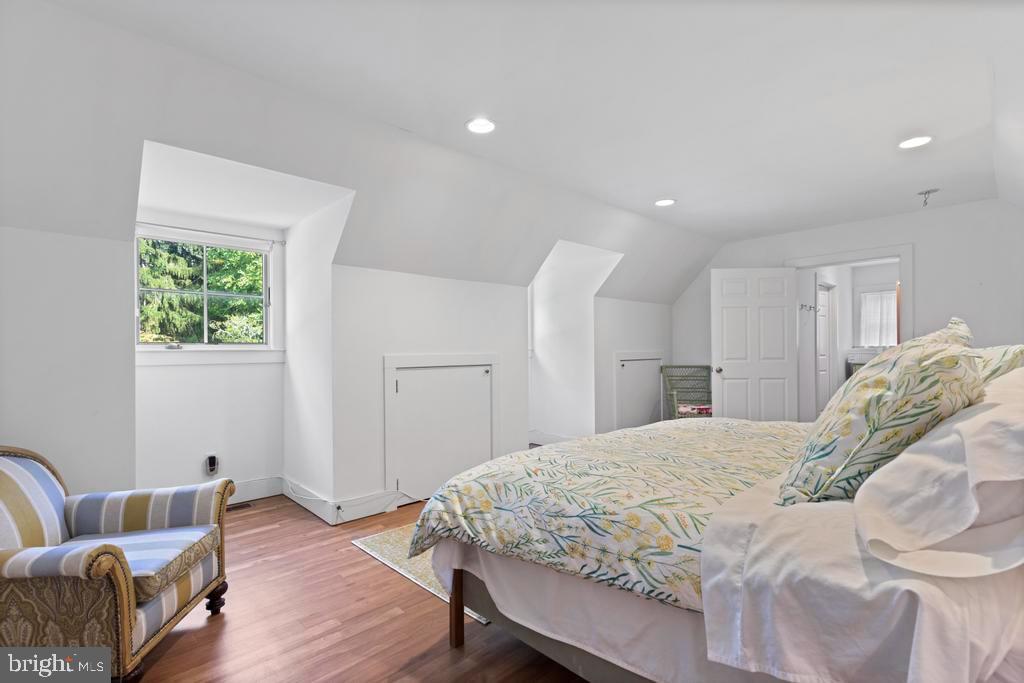 1038 Mill Rd Circle Rydal, PA 19046 - Photo 47 of 61 a bedroom with a bed and a couch