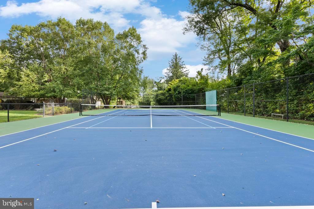 1038 Mill Rd Circle Rydal, PA 19046 - Photo 55 of 61 a view of a field with a tree in the background