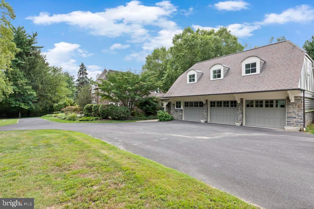 1038 Mill Rd Circle Rydal, PA 19046 - Photo 58 of 61 a view of a house with a backyard and basketball court