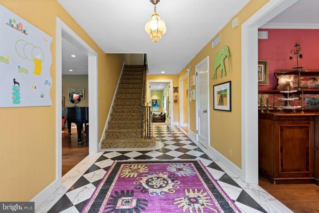1038 Mill Rd Circle Rydal, PA 19046 - Photo 9 of 61 a view of an entryway with wooden floor