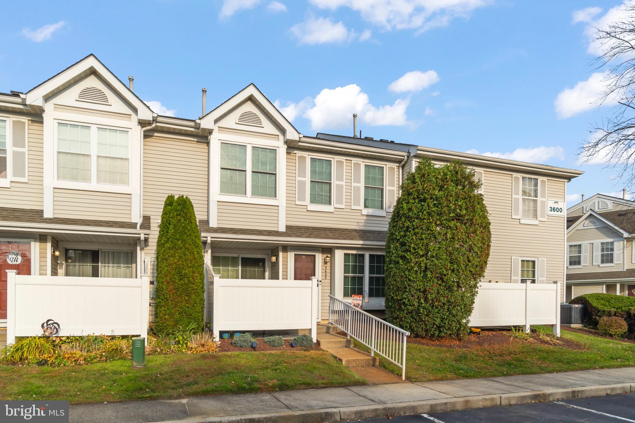 3603 Fenwick Lane Mount Laurel, NJ 08054 - Photo 15 of 17 a front view of a house with a yard and garage