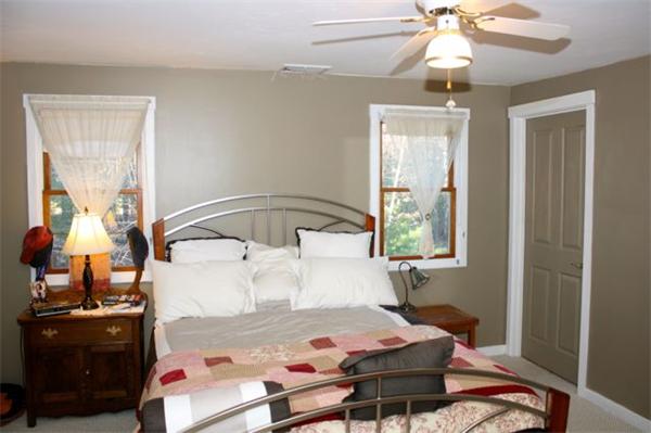 90 Bullard Road Princeton, MA 01541 - Photo 17 of 30 a bedroom with a bed and wooden floor
