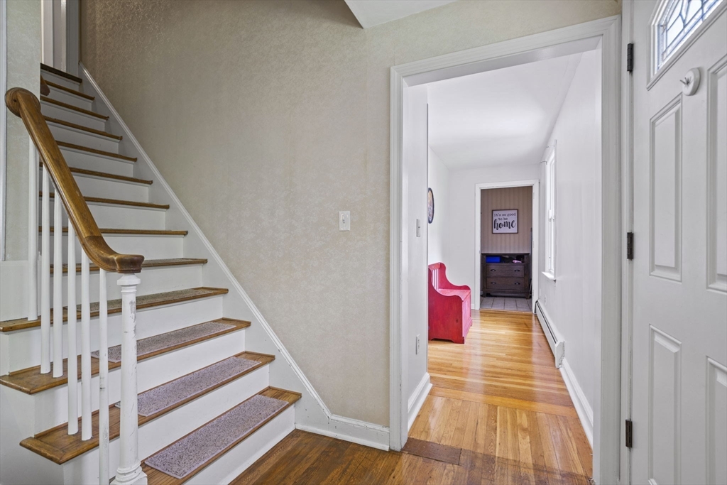 50 Haverhill Road Topsfield, MA 01983 - Photo 29 of 42 a view of a hallway with wooden floor and entryway